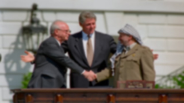 The Public Handshake from "Oslo". The Public Handshake An image of possibility Yitzhak Rabin and Yasser Arafat shake hands as Bill Clinton stands between them.